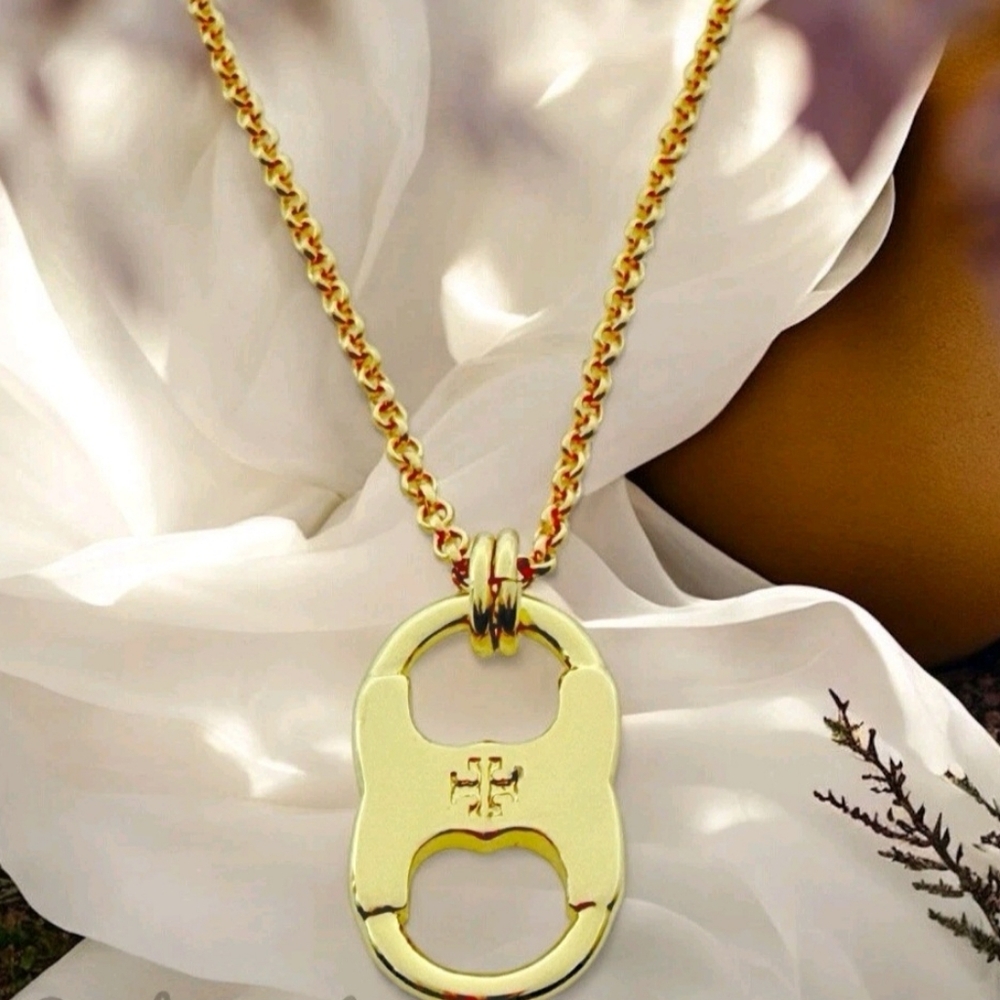 Tory Burch Gold Gemini Pendant Necklace - Picture 1 of 3
